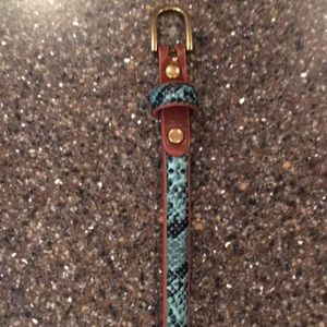 Skinny green snakeskin print belt